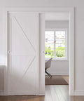 Installed Closet Sliding Barn Doors Set, 72 Inches By 80 Inches, Double K Shape Panels With Hardware Kit in white MDF finish.