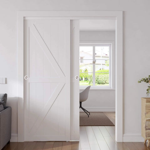 Installed Closet Sliding Barn Doors Set, 72 Inches By 80 Inches, Double K Shape Panels With Hardware Kit in white MDF finish.