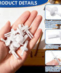 Person holding Nylon Nail Drive Anchors 50 Pack White Truss Nail Drive Anchors Three Quarters By One Quarter Inch for various uses.