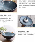 USZWBY Blue Bathroom Vessel Sink,Round 16.5" Tempered Glass Vessel Vanity Sink shown with waterfall faucet and smooth self-cleaning surface.