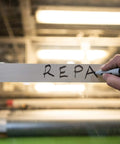 Hand writing on silver duct tape labeled REPA, highlighting Multi-Use Silver Duct Tape 1.88 in x 60 yd x 7 mil, 1 Pack, Contractor Grade.