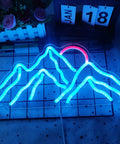 Mountain-shaped blue and red neon sign on grid background with flowers and date blocks