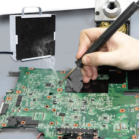 Soldering Smoke Absorber With Carbon Filter Fume Extractor Fan For DIY Desoldering And Rework Station in use during soldering.