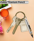 Ultra Durable Titanium Pocket Pencil With Retractable Tip on keychain next to keys, showcasing compact size and portability.