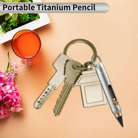 Ultra Durable Titanium Pocket Pencil With Retractable Tip on keychain next to keys, showcasing compact size and portability.