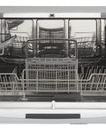 Interior view of Total Game Changer Compact Countertop Dishwasher In Brushed Stainless Steel with space for six place settings.