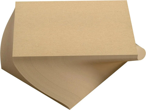 Stack of 8.5 X 11 Inch Chipboard Sheets, 100 Sheets of 22-Point Kraft Board for Crafts and DIY Projects, angled view.