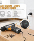 8V USB Rechargeable Cordless Drill Set And Home Tool Kit with charger, showing power drill connected to USB-C outlet on table