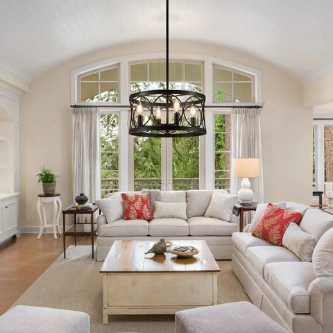 Dope Modern Farmhouse Black Drum Chandelier Light Fixture hanging in living room with sofas and coffee table