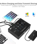 Heavy Duty Industrial USB 3.0 Hub With 20 Ports Delivers Slap 5Gbps Transfer Speeds And Badass 200W Charging Station connected to laptop and tablet.