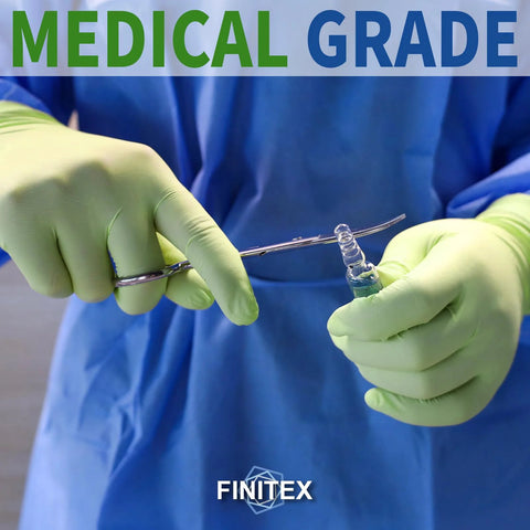 Green nitrile disposable gloves, small size, 3.5 mil, powder-free, close-up view with vial and scissors.