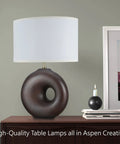 Two Pack Transitional Ceramic Table Lamps Set In Brown And Blue With White Hardback Empire Shade, displayed on a wooden table