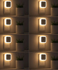 Sujeet square plug-in night light with warm white LED, mounted in wall outlet beside a potted plant.