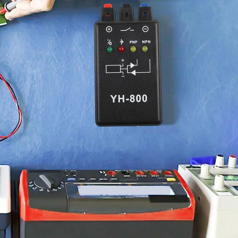 Battery Powered Proximity And Magnetic Sensor Tester With Photoelectric Compatibility Portable DC Sensor All In One Analyzer Tool for Two Wire Three Wire And Four Wire PNP NPN Systems Across Inductive Capacitive And Photoelectric Types shown in a handheld black design on a blue background.