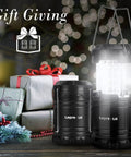 LED Lanterns Battery Powered For Camping And Outdoors, collapsible lanterns next to wrapped gifts, holiday setting