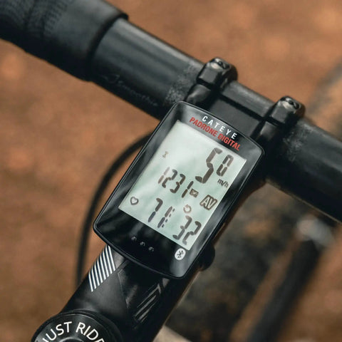 Padrone Digital Bluetooth Cycling Computer With IPX8 Waterproof Build mounted on bike handle, displaying speed and time.