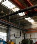Twenty Eight Pack Badass Twelve Inch Wire S Hooks Engineered For Heavy Duty Powder Coating And Spray Painting Jobs While Keeping Your Shop Gear Tidy And Secure, black hook hanging in a workshop.