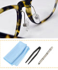 Close-up of eyeglasses with nose pads and repair tools from DIY Eyeglass Repair Kit 150 Pcs Screws Nuts Washers Tweezers Nose Pads