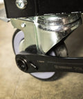 Person using Two Piece X6 Four In One Black Oxide Spline Ratcheting Metric Wrench Set For Tight Access And Maximum Versatility on wheel