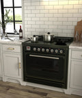 Kitchen with Brushed Gold Cabinet Handles 10 Pack 5 Inch Hole Center Pulls on white cabinets, featuring a modern stove and marble countertop.