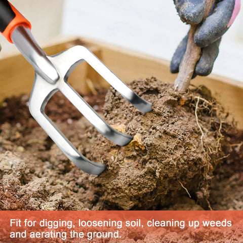 Beast Mode Heavy Duty Hand Cultivator with ergonomic handle and three claws loosening soil in a small garden bed