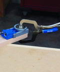 Micro Face Clamp 2 Inch Pocket Hole Clamp securing wood with pocket hole jig system, showing ergonomic grip and adjustable pressure.