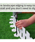 Installing Arched White Garden Edging 33 Feet Long with 60 Plastic Stakes Flexible No Dig Lawn Border in grass
