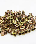 Pile of 100 gold-toned knurled flat-head rivet nuts, 1/4-20 UNC, carbon steel