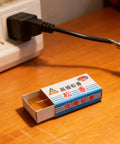 Rosin Flux Soldering Paste Dope 10 Piece High Purity Cream with packaging on wooden table near power outlet