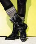 Women Mid Calf Waterproof Garden Rain Boots With Killer Traction And Legit All Day Comfy Support Insole For Yard Work Or Rainy Days Snazzy Black And White Polka Dot Style Made Stateside True To Size, shown with cozy socks.