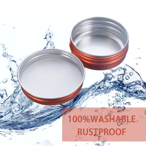 Bulk 270 Pcs 1 Oz 30ml Aluminum Tin Jars With Screw Top Lids And Blank Labels For Cosmetics Crafts Or Travel Grab And Go Durable Round Cans 2.1 Inch Diameter By 0.78 Inch Depth Orange Finish open and empty with water splash.