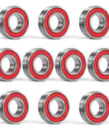 Ten-pack of 6205 2RS deep groove bearings with red rubber seals for stable, pre-lubricated performance in various applications.