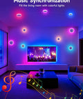 Smart 9 Piece LED DIY Constellation Light Kit With RGB Color Changing, Music Sync, illuminating a living room with vibrant colors
