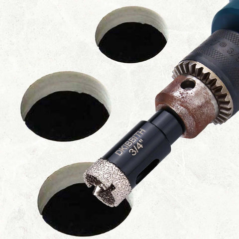 Front-right view of a 3/4 inch diamond-tipped hole saw bit with pilot bit mounted in a drill chuck