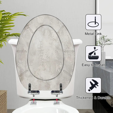 Elongated Concrete polished abstract silver grey grunge Toilet Seat on a ceramic toilet; showing metal hinges and installation details.