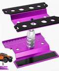 Aluminum RC Repair Stand for Ten Scale Cars With 360 Degree Rotation and Adjustable Height From Ninety to One Hundred Thirty Three Millimeters, Fits One Eighth to One Fourteenth Scale Crawlers Drifters Buggies and Trucks, shown in purple.