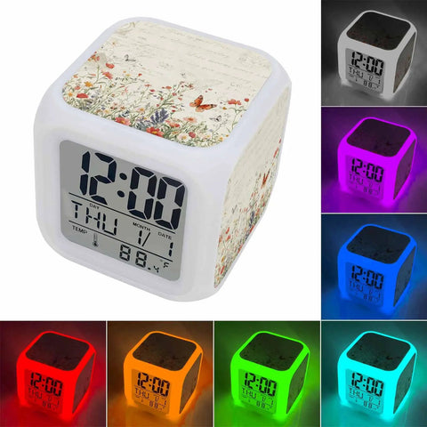 Solid Butterfly Floral Digital Alarm Clock With Silent Sleep Mode And Chill Nightlight displaying time date and temperature for bedroom or desk.