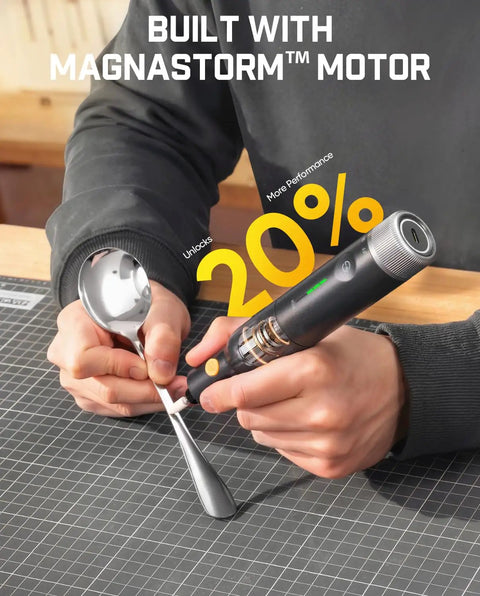 Cordless Rotary Tool Kit With 25000 RPM Motor 5 Speed Settings 44 Accessories hands using on metal spoon
