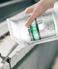Crack Repair Sealant For Concrete And Surfaces 500Ml being applied to cracked concrete surface with nozzle