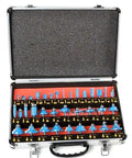 Pro Shop Essential Kickstart 35 Piece Router Bit Set With 1/4 Inch Shank Blades Featuring Sharp Tungsten Carbide Tips To Give You Extra Muscle For Fast Woodworking Projects Plus Rugged Aluminum Carry Case opened showing assorted bits in aluminum case.