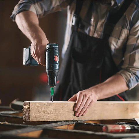 Carpenter using Pro Grade Countersink Drill Bit Set For Wood 5 Piece Includes Sizes 4, 6, 8, 10, 12 High Speed Steel on wood plank