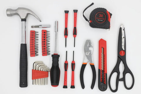 39 Piece Home Tool Kit With Portable Storage Box Your Go To Repair Set For Apartment Home Dorm DIY Projects And Housewarming Gift Includes Hammer Pliers Screwdriver Bits Hex Keys Tape Measure Utility Knife Scissors And More arranged on white background