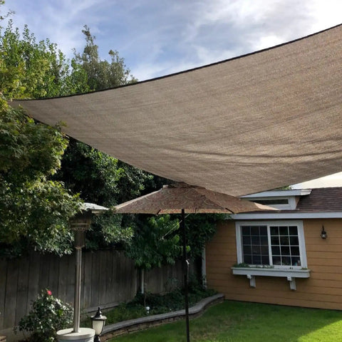Rectangular Outdoor Shade Sail 6ft 6in By 9ft 9in UV Block 80 Percent Breathable Sun Shade Cloth installed in a garden