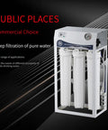 Top Shelf 400 Gpd Reverse Osmosis Water Purification System Hella Pure Direct Drinking Filter, white metal frame with three filters, for commercial use.