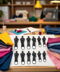 12 Piece Black Zipper Repair Kit With Replacement Sliders And Teeth Universal Fit For Jackets Pants Bags And More displayed on a table with fabrics