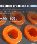 Industrial-grade orange ABS tool holders highlighting wear resistance and material cost benefits, arranged on a surface.