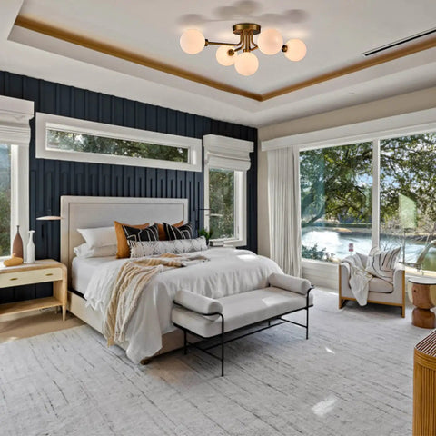 Gold Sputnik Ceiling Light Fixture With Globe Shades in a modern bedroom setting, ceiling-mounted, industrial style with a dope vibe.