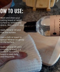 Applying Top Shelf Food Grade Mineral Oil Eight Ounce Wood Conditioner on a cutting board using a cloth.
