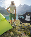 Hammock Camping Chair Set Outdoor Folding Rocker Lawn Seats With High Back And Stand by a tent at a lake