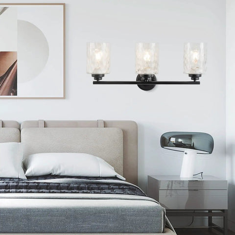 Go To Modern Matte Black Vanity Light Fixtures 24 Inch Three Light Hammered Glass Industrial Sconces above bed